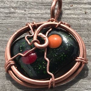 Glass piece with copper pended hand made